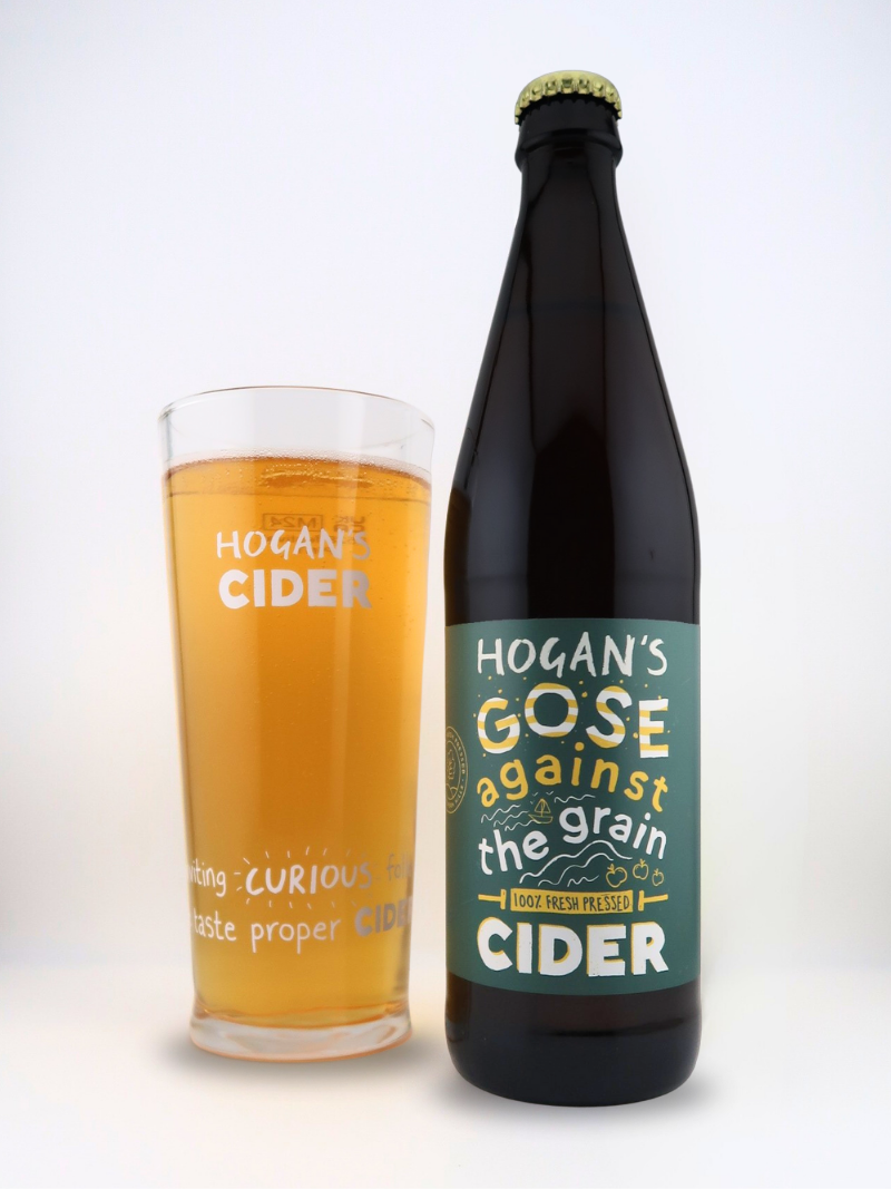 Hogan’s Gose Against The Grain bottle and glass – tangy and refreshing brett-fermented craft cider made from fresh-pressed apples and Cornish sea salt.