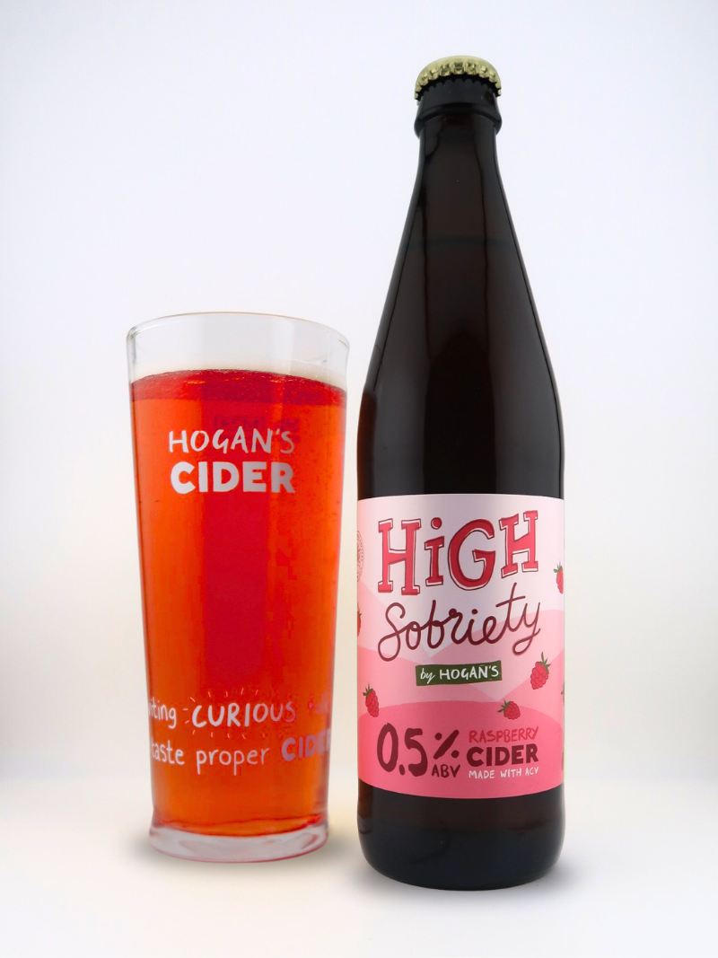 Hogan’s High Sobriety Raspberry 0.5% craft cider poured into a glass – fruity, refreshing and naturally made with fresh-pressed apples and raspberries.